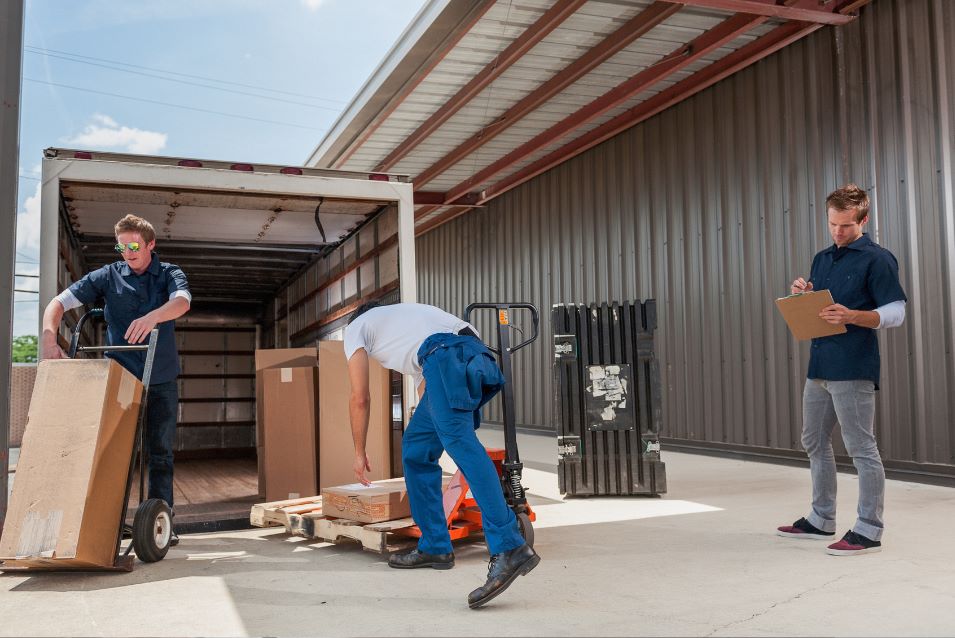 Warehouse workers loading goods